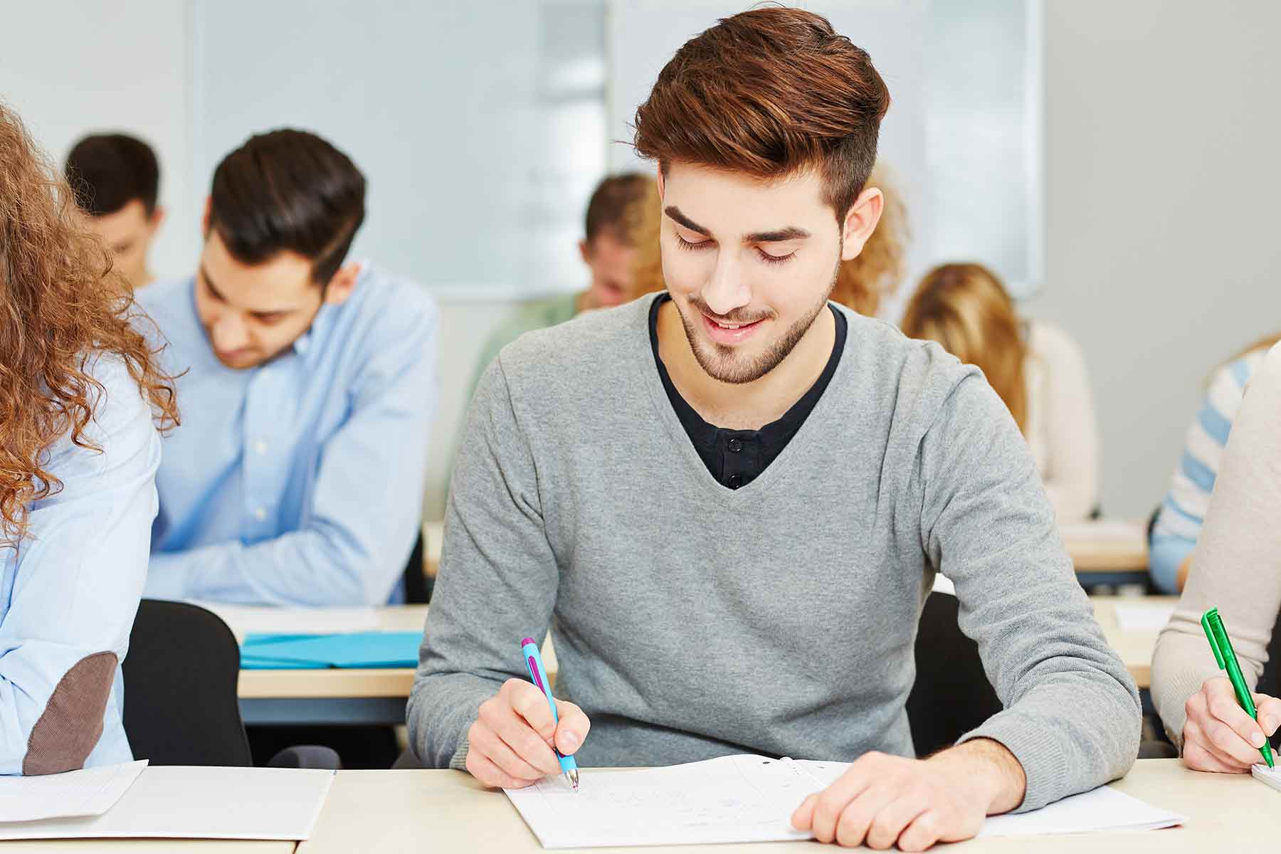 A group of examiners taking the TEAS test at an exam center